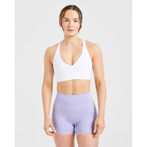 Soutien-gorge de sport respirant en dentelle à maintien élevé pour femmes, avec logo personnalisé, blanc, grande taille, bretelles réglables à l'avant et au dos, décolleté en V - Product Image 1