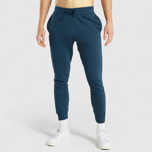 Pantalon de jogging en molleton brossé doux avec taille élastique, cordon de serrage réglable, poches latérales profondes, revers côtelés, durable - Product Image 1