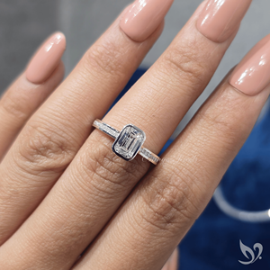 Sleek emerald cut 1ct lab grown diamond ring with bezel <b>frame</b> and channel band in 10k white gold - Product Image 4