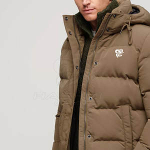 Chaqueta acolchada para hombre, cálida y cómoda, ideal para salidas informales y para usar en capas durante las temporadas de otoño o invierno. - Product Image 2