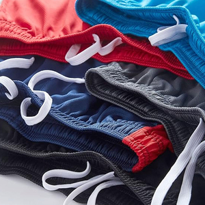 Shorts de sport décontractés pour hommes, séchage rapide, respirants, couleur unie, taille élastique, mi-longs, en polyester tissé avec bande latérale - Product Image 5