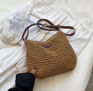 Complement your sunny weather outfits with this charming Natural yarn <b>bag</b> featuring a <b>soft</b> slouchy shape and <b>leather</b> details tod - Product Image 3