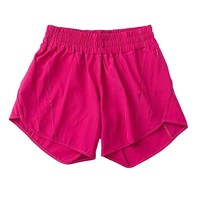 Shorts de sport jaune fluo pour femme, taille élastique, séchage rapide, tissu tricoté avec poches, coupe régulière, taille mi-haute, couleur unie