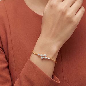 Elegant 14K Yellow Gold Women's <b>Bangle</b> <b>Bracelet</b> with Lab Grown Diamond Round Brilliant Cut and Leaf Motifs - Product Image 3