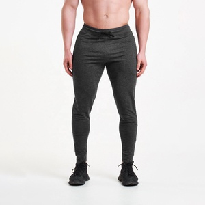 Pantalon de jogging gris foncé pour homme, personnalisable, taille élastique avec cordon de serrage et poches latérales, coupe décontractée, poids moyen, mélange coton et élasthanne - Product Image 1
