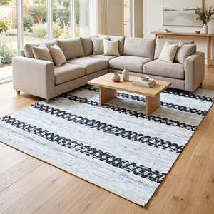 Grand tapis de sol en cuir recyclé avec motif à rayures tribales pour salon, style farmhouse, intérieurs nordiques et modernes - Product Image 1