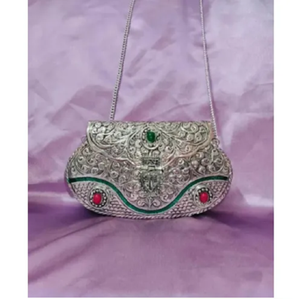 Cylindrical golden brass hand clutch embellished with delicate <b>net</b> patterns and <b>green</b> stone accents,at wholesale prices. - Product Image 4