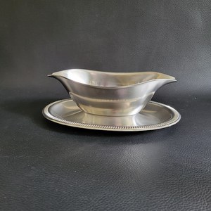 Salsera de Acero Inoxidable con Forma Única para Juegos de Comedor - Product Image 1