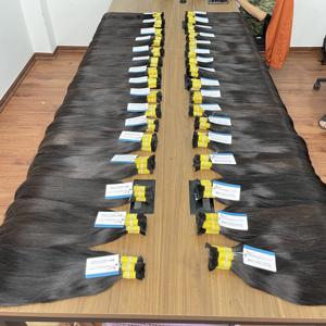 Vente en gros d'extensions de cheveux Remy noirs naturels 100% bruts de super haute qualité vietnamienne soyeuse sans emmêlement sans perte de cheveux de bébé - Product Image 2