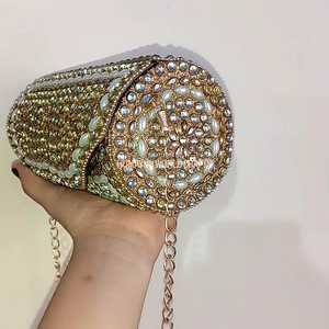 Elegant <b>gold</b> kundan work <b>clutch</b> with pearls and crystals, handcrafted for weddings, parties, and festive occasions. - Product Image 1