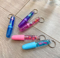 Stylo à bille flottant à flamant rose rempli de liquide, porte-clés, 0,5 mm, article promotionnel en plastique