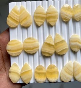 Vente en gros : Paire assortie de cabochons en aragonite jaune naturelle, pierres précieuses brutes polies, forme ovale à dos plat, pour la fabrication de bijoux - Product Image 3