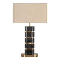 Lampe de table d'appoint en marbre design avec finition dorée luxueuse, forme linéaire épurée et beauté décorative moderne