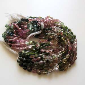 ลูกปัดทัวร์มาลีนสีชมพูเขียวธรรมชาติทรงรี เรียบเนียน รูปทรงแตงโม พลอยทัวร์มาลีนหลากสี ร้อยเป็นเส้น หินเม็ดเดี่ยว - Product Image 5