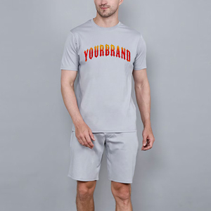 ชุดเซ็ตเสื้อยืดกางเกงขาสั้นผู้ชายลายพิมพ์ ผ้าฝ้าย 100% สไตล์ฮิปฮอป สำหรับฤดูร้อน ขายดีที่สุด ระบายอากาศได้ดี เป็นมิตรกับสิ่งแวดล้อม - Product Image 1