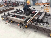 Système Flexible de table de soudage de coulée d'acier 3D de prix usine D28 D16 avec des accessoires de montage de gabarit de serrage pour le soudage de robot