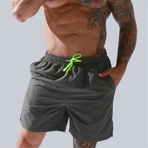 Pantalones cortos deportivos de malla de poliéster de alta calidad para hombre, cortavientos de playa informal, 6XL, técnicas bordadas para correr en verano, gimnasio - Product Image 6