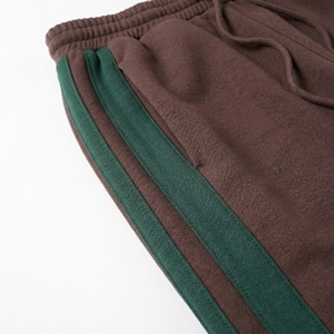 กางเกงวอร์มลายทางสีน้ำตาลเขียว |   กางเกงจ็อกเกอร์แบบมีแผงข้างตัดกัน |   กางเกงวอร์มสตรีทแวร์ทรงโอเวอร์ไซส์ |   ผู้ผลิต OEM ตามสั่ง - Product Image 5