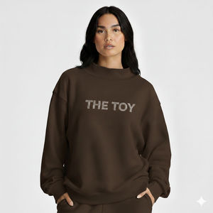Pull ample à col montant pour femme, conçu avec un tissu chaud et une coupe confortable, idéal pour une mode décontractée en automne et en hiver. - Product Image 1
