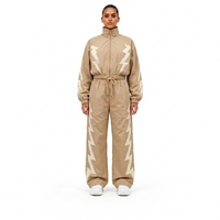 Survêtement beige à imprimé géométrique pour femmes, coupe ample, style sportif, avec fermeture à cordon et poches latérales