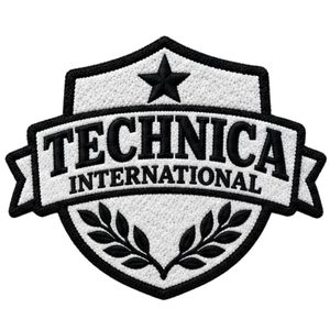 ตราสัญลักษณ์ปักสีดำขาว Technica International แบบ 3 มิติ สำหรับเสื้อแจ็คเก็ต กระเป๋า ชุดยูนิฟอร์ม และเครื่องแต่งกาย - Product Image 1