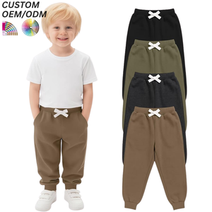 Pantalon de jogging en coton personnalisé pour garçons avec taille élastique et cordon de serrage, séchage rapide, ODM, décontracté pour enfants, avec empiècements aux genoux et ourlet côtelé - Product Image 1