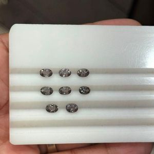 พลอยสปิเนลสีเทาธรรมชาติทรงรีขนาด 6x4 มม. คุณภาพสูงจากแทนซาเนีย สะอาดภายใน ไม่ผ่านการปรับแต่ง ขายส่ง - Product Image 6