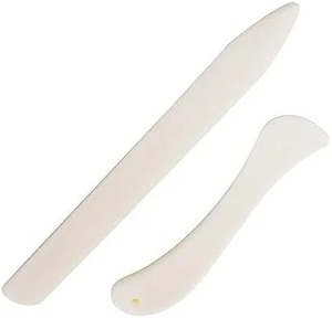 Outil professionnel écologique de pliage et de rainurage en os de buffle, style animal sculpté et poli, pour artisanat naturel et fabrication de cartes, par Faizacraft - Product Image 1