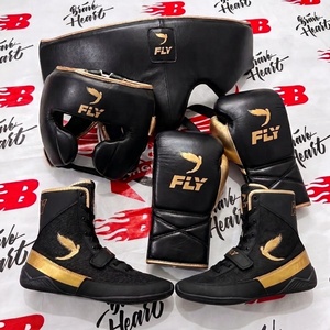 Último Conjunto de Entrenamiento y Sparring Fly Negro y Dorado, Incluye Protector Inguinal, Guantes, Calzado en Todos los Colores para Adultos - Product Image 1