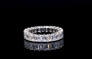 Emerald cut <b>diamond</b> eternity band <b>ring</b> with endless brilliance for wedding anniversary stacking and luxury fine jewelry - Product Image 4