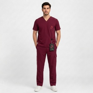 Traje quirúrgico premium para el cuidado de la salud, ofrece comodidad transpirable, apariencia elegante y diseño funcional para el uso diario de los profesionales médicos. - Product Image 1