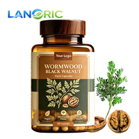 Complément alimentaire OEM en capsules dures à base de poudre naturelle de graines de citrouille et de papaye, d'huile d'origan, d'ail, de noix noires et d'armoise pour la détoxification et le soutien immunitaire