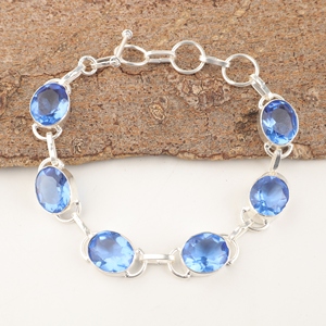 Bracelets de mode en argent sterling 925 avec tanzanite bleue de forme ovale, sertie de facettes, en laiton, avec design tennis et sertissage clos - Product Image 2