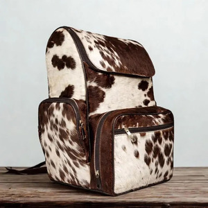 Premium cowhide leather hair school/college <b>backpacks</b> bulk supplier OEM custom branding export quality student bags worldwide - Product Image 1