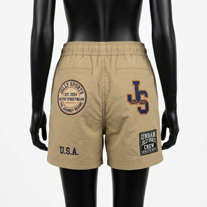 Shorts pour femmes en nylon léger 120 GSM, coupe-vent, kaki, avec patch chenille et logo personnalisé. - Product Image 3