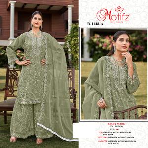 Ensemble élégant en organza Gharara avec mèches de broderie et fond Sarara assortis, parfait pour les occasions festives - Product Image 1