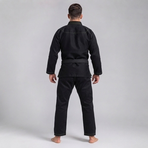 Tenue de grappling athlétique professionnelle avec veste et pantalon renforcés, conçue pour l'entraînement, la compétition et l'usage quotidien - Product Image 4