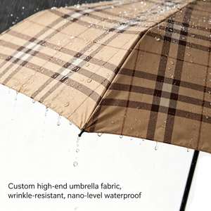 Paraguas Moderno de Viaje con Rayas en Cuadrícula, Automático, Plegable en Tres Partes, Resistente a la Lluvia, con Revestimiento Negro Anti-UV, Logotipo Personalizado OEM - Product Image 2