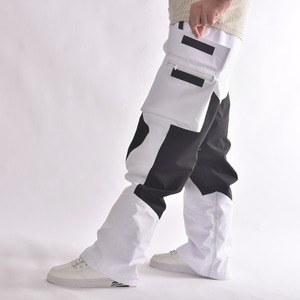 Pantalon de ski et de neige imperméable, coupe ample, bicolore blanc et noir, chauffant, coupe-vent, avec aérations et guêtres intégrées - Product Image 1