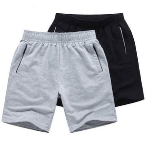 Shorts gris en polyester pour homme avec cordon de serrage, couleur unie, style décontracté, logo frontal, taille mi-haute, tissu respirant à motif, séchage rapide - Product Image 1