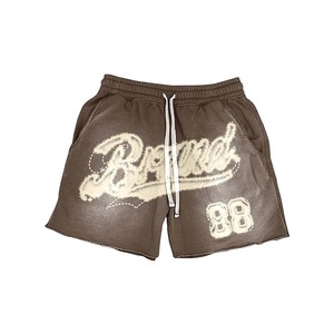 Pantalones cortos de algodón para hombre con lavado ácido, estampado puff, bordado de chenilla, pedrería y logo personalizado. - Product Image 5