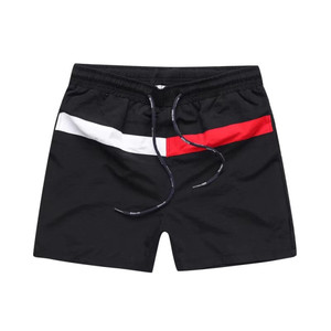 Shorts de bain pour hommes bleus avec bande latérale rouge, blanche et noire, séchage rapide, taille à cordon de serrage, décontractés - Product Image 6