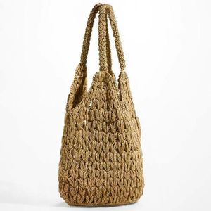 Natural <b>Rafia</b> Beach <b>Bag</b> Lightweight Summer Straw Tote Seagrass Hand <b>Bags</b> for Boutique Retail Supply OEM Manufacturer - Product Image 1
