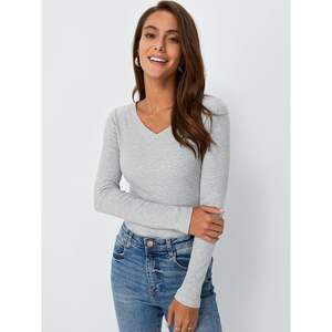 Tops de moda para mujer 2025, ropa de punto informal básica acanalada con cuello en V de manga larga, trajes de otoño y ropa interior de invierno - Product Image 1