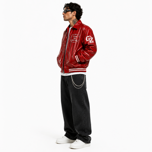 Chaqueta universitaria de cuero charolado rojo personalizada con parche de marca personalizado y puños con ribete de rayas acanaladas para uso unisex. - Product Image 5