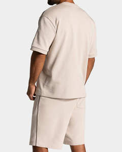 Camiseta y pantalones cortos blancos extragrandes para hombre, diseño OEM de última generación, con ribetes, mezcla de algodón transpirable, para gimnasio y ropa urbana. - Product Image 2