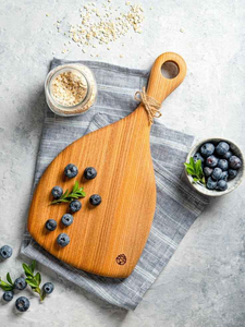 Tabla de cortar de madera recuperada con borde de madera de mango para una preparación de alimentos limpia y elegante en la cocina. - Product Image 4