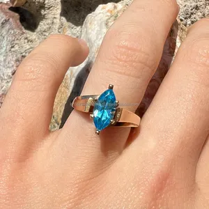 Anillo de compromiso minimalista de oro amarillo con diamante azul talla marquesa para mujer, anillo de promesa moderno y llamativo para ella. - Product Image 1
