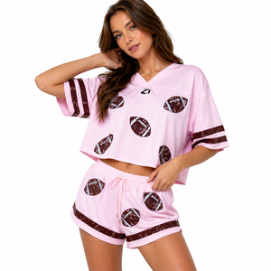 Custom Women’s Cropped Pink American Football Jersey V Neck Sports Inspired Two Piece Short Set Private Label Apparel Supplier - Product Image 1