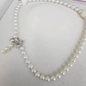 Collier de perles d'eau douce rondes de 7-8 mm pour femmes avec nœud, accessoires de mode avec des défauts discrets, vente en gros - Product Image 4